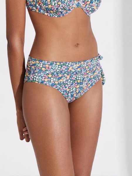 Εικόνα της Ysabel Mora φλοράλ πολύχρωμο ψηλόμεσο μαγιό σλιπ, με φιόγκο στο πλάι.