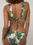Εικόνα της Γυναικείο σλιπ μαγιό "Koani" reversible, με δεσίματα στα πλαϊνά. Εμπριμέ τροπικό σχέδιο από τη μια πλευρά, λεοπάρ από την άλλη.