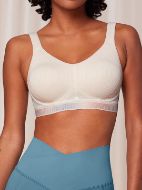Εικόνα της Triumph Triaction Cardio Cloud P Ex Ανοιχτό Μπεζ/Σομόν Αθλητικό Σουτιέν Χωρίς Μπανέλα.